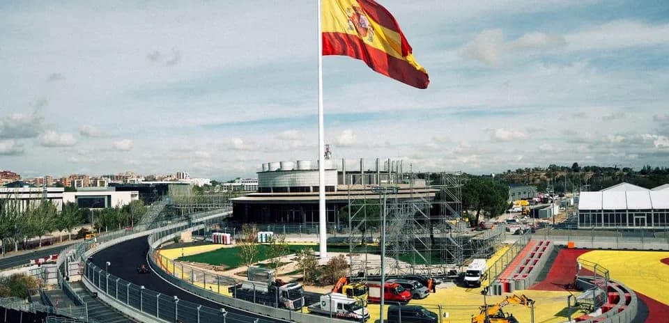 Spanish flag flying over racetrack construction site