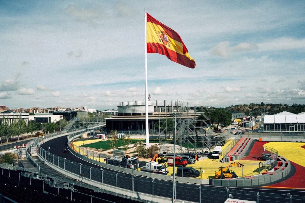 Spanish flag flying over racetrack construction site
