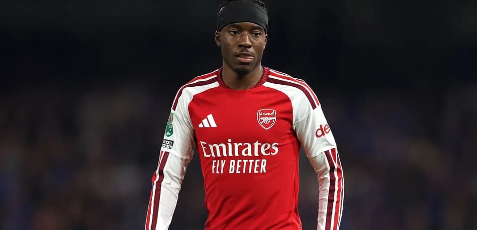 Player wearing Arsenal jersey during match