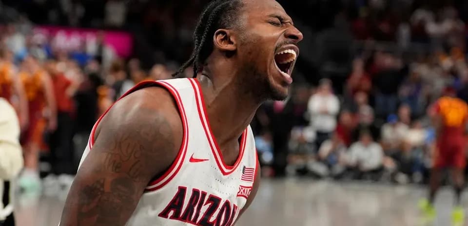 Player celebrating during a college basketball game