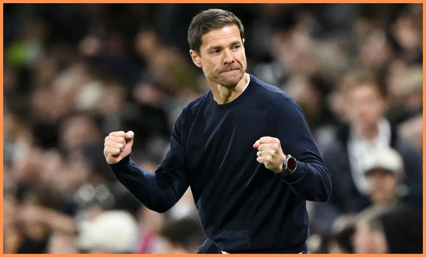 Coach celebrating a goal during a match