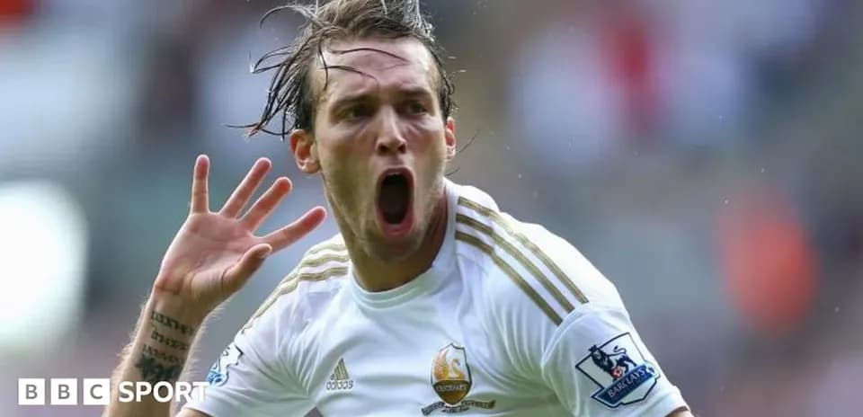 Player celebrating after scoring a goal for Swansea
