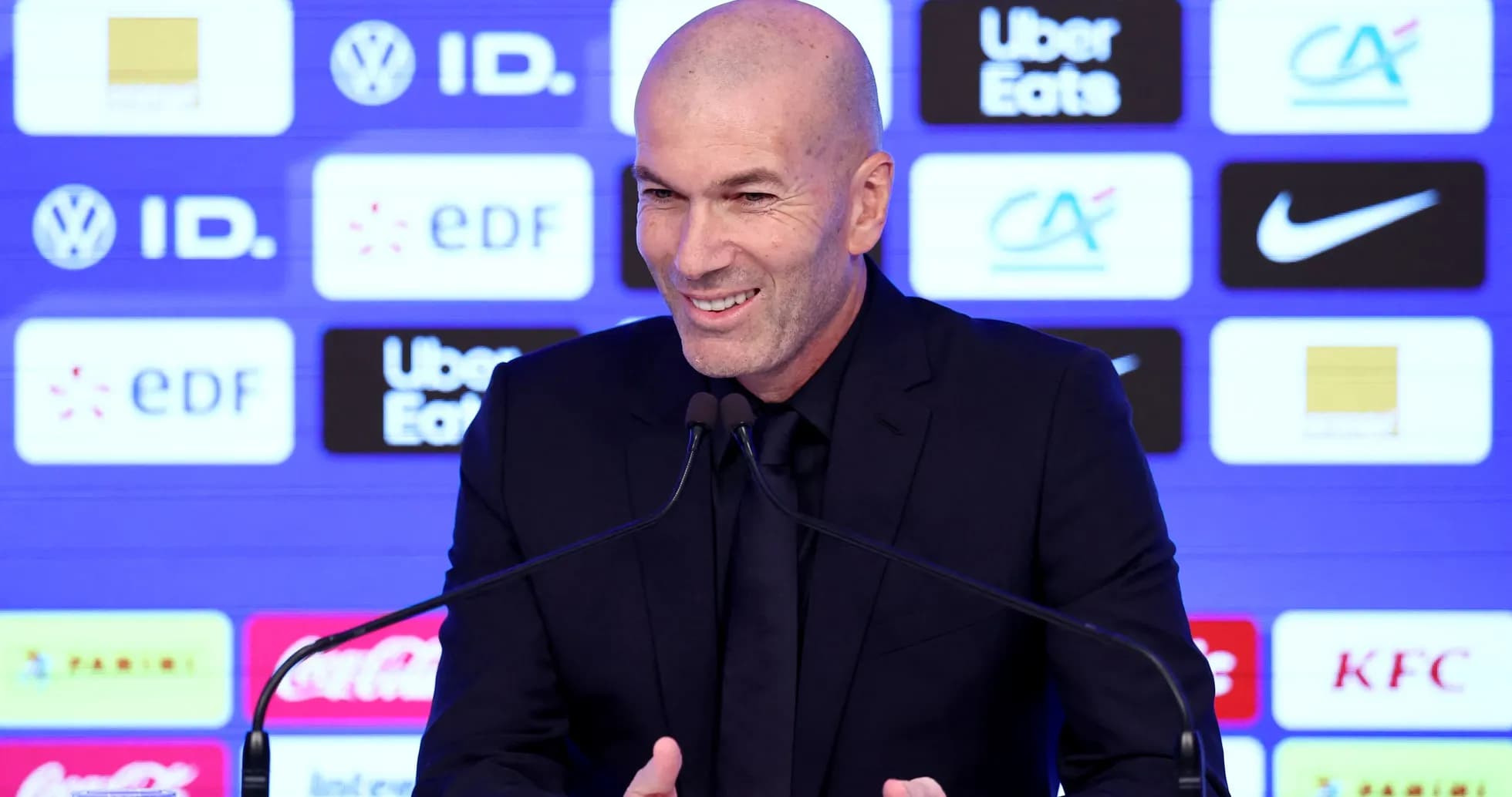 Manager speaking at press conference podium
