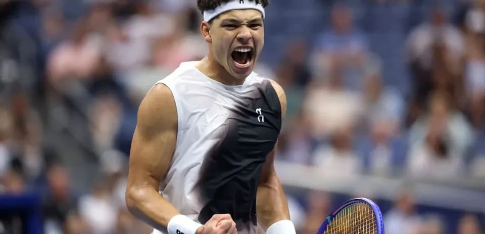 Tennis player celebrating during a match