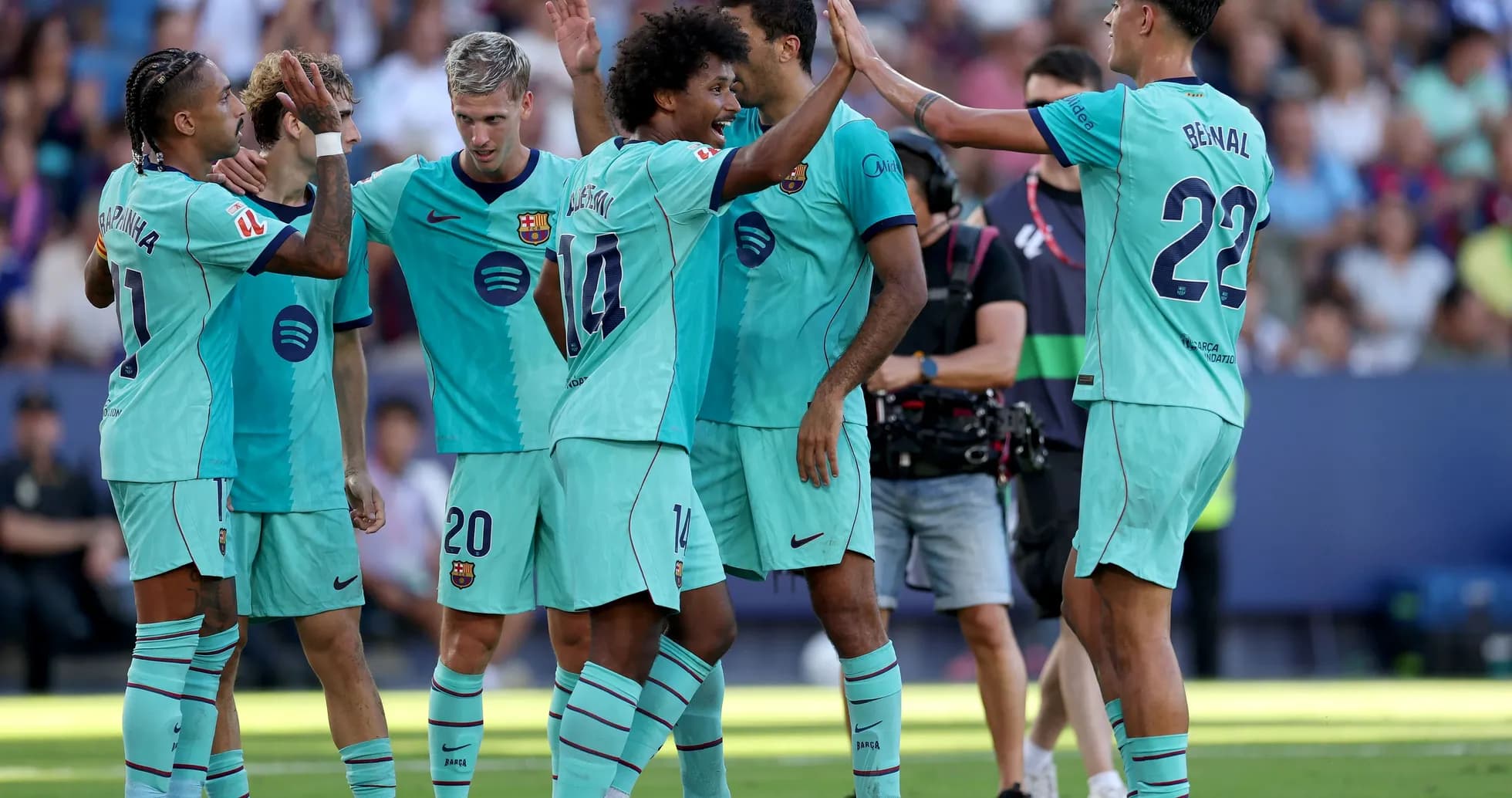 Barcelona players celebrating a goal during match