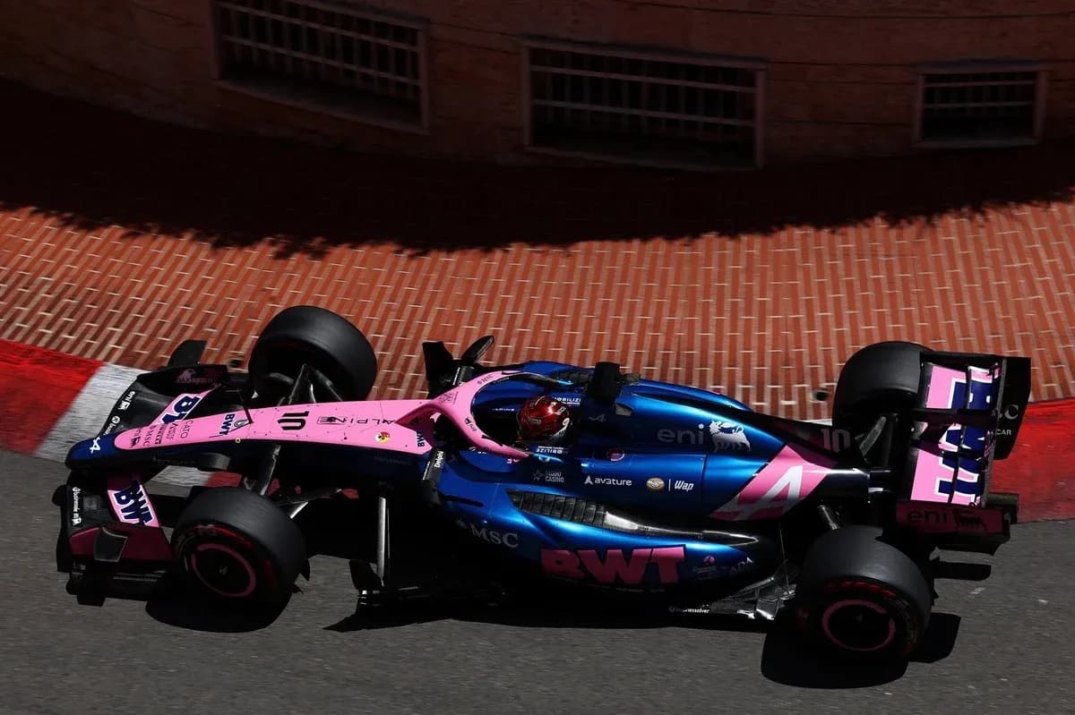 Formula 1 car racing on a street circuit