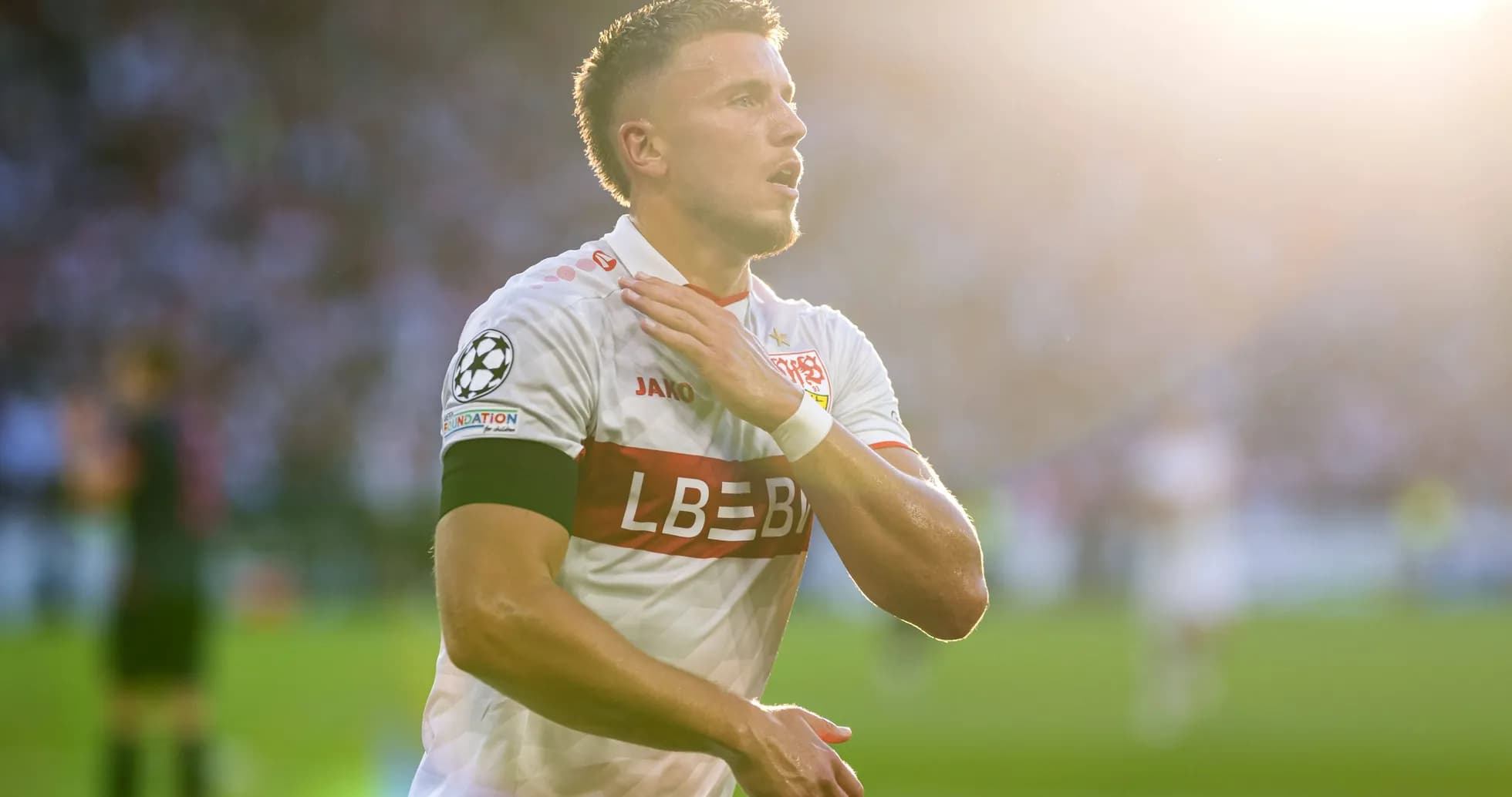 Player celebrating after scoring a goal in match
