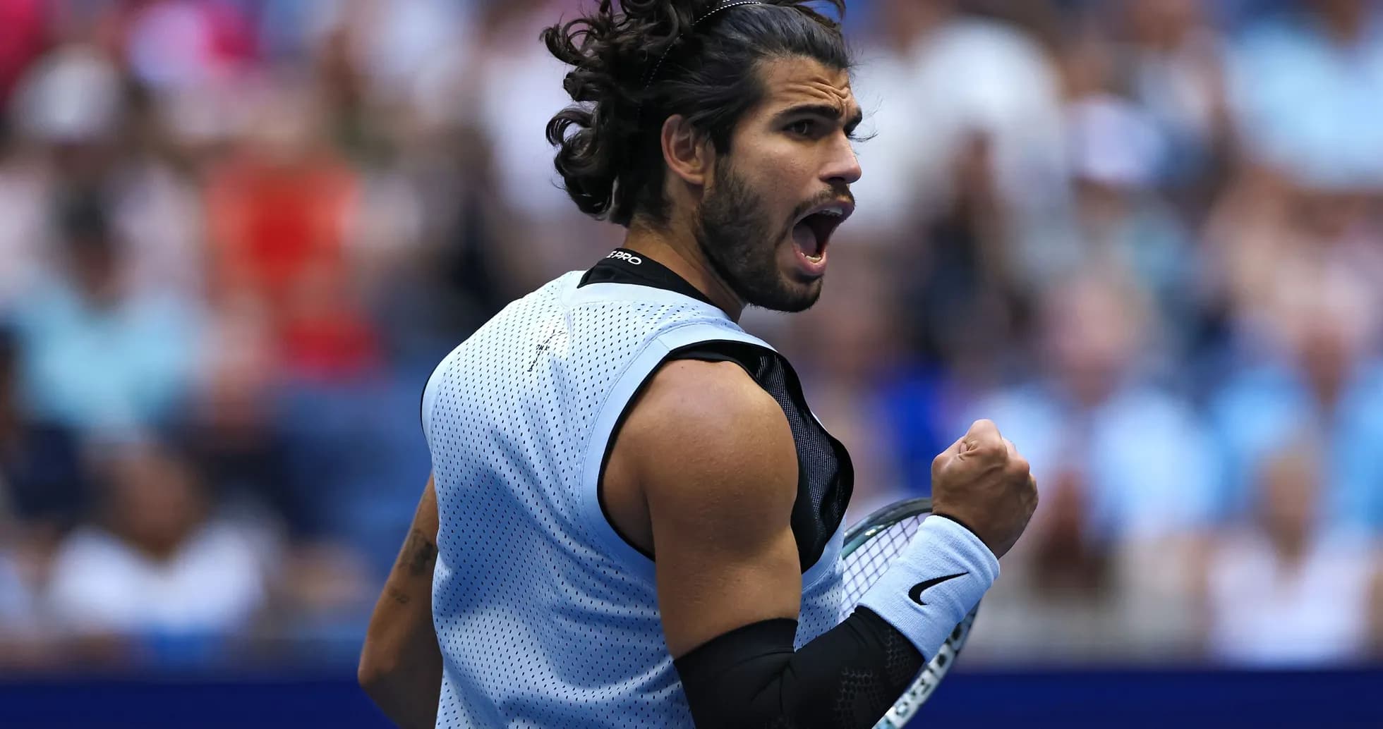 Tennis player celebrating during match at US Open