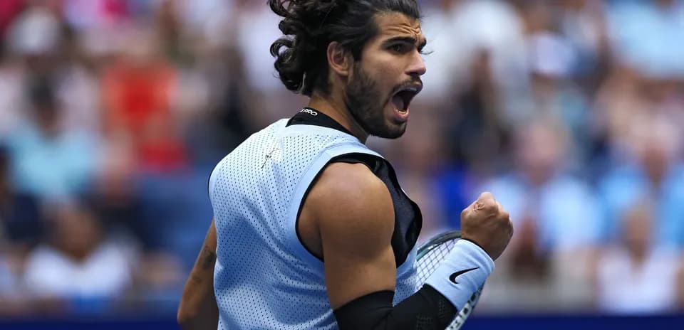 Tennis player celebrating during match at US Open