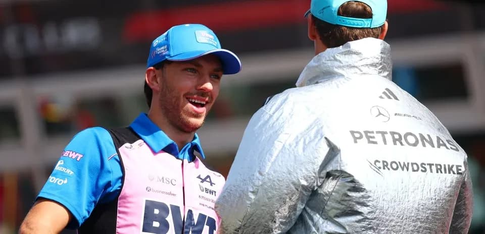 Two drivers chatting in paddock before race