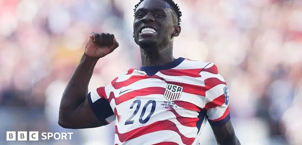 Player celebrating a goal in USA kit