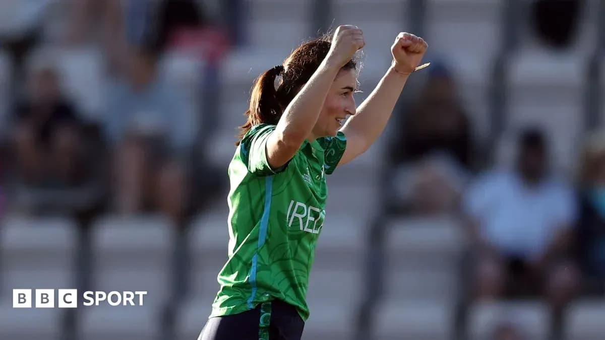 Player celebrating during a match in green jersey