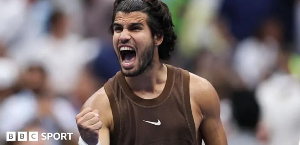 Tennis player celebrating with raised fist during match