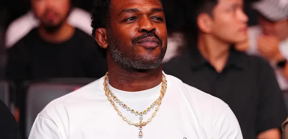 Man wearing jewelry at a UFC event