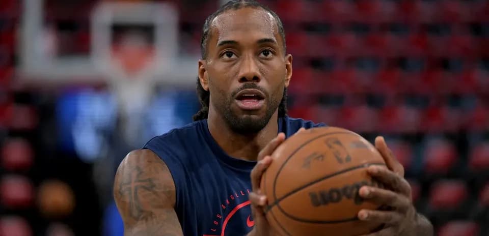 Player practicing free throw during warm-up session