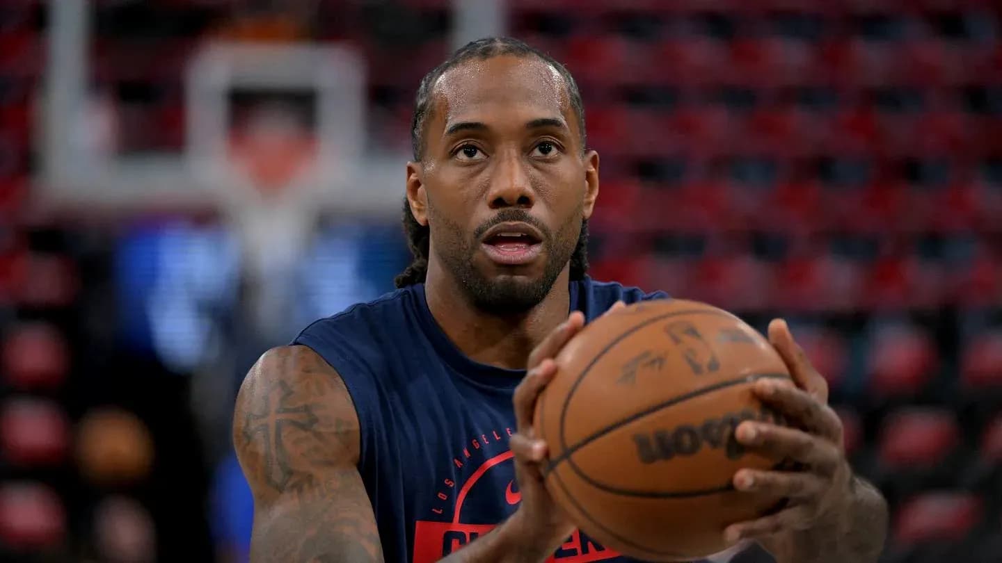 Player practicing free throw during warm-up session