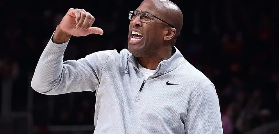 Coach shouting instructions during basketball game