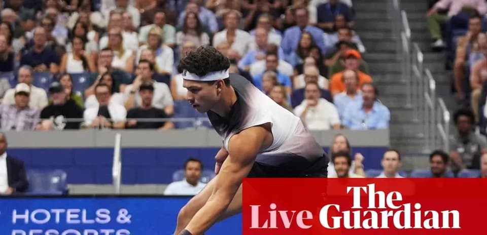 Player serving during a tennis match with audience