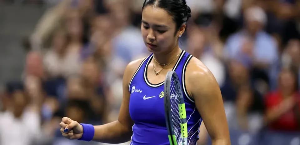 Tennis player celebrating a point during match