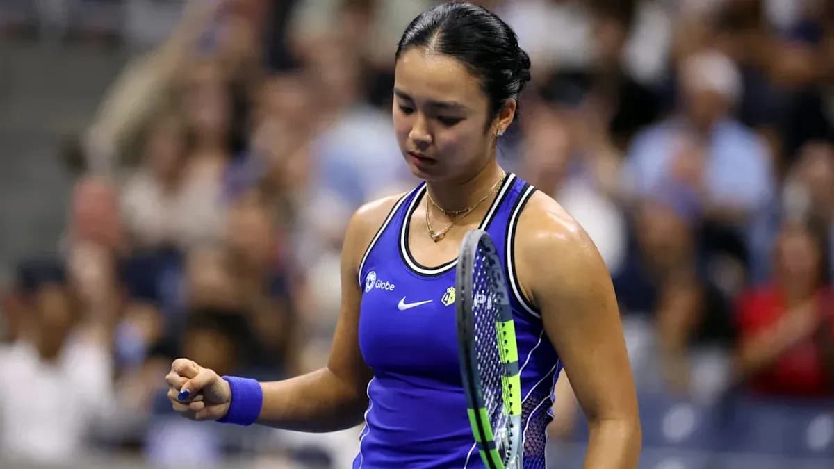 Tennis player celebrating a point during match