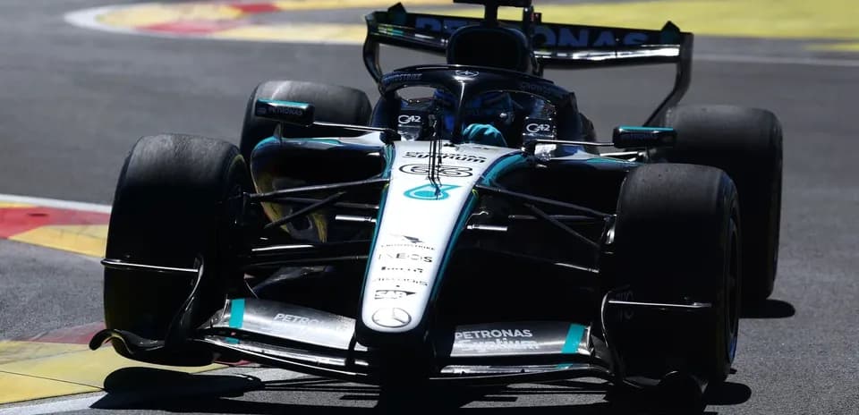 Mercedes Formula 1 car navigating a corner on track