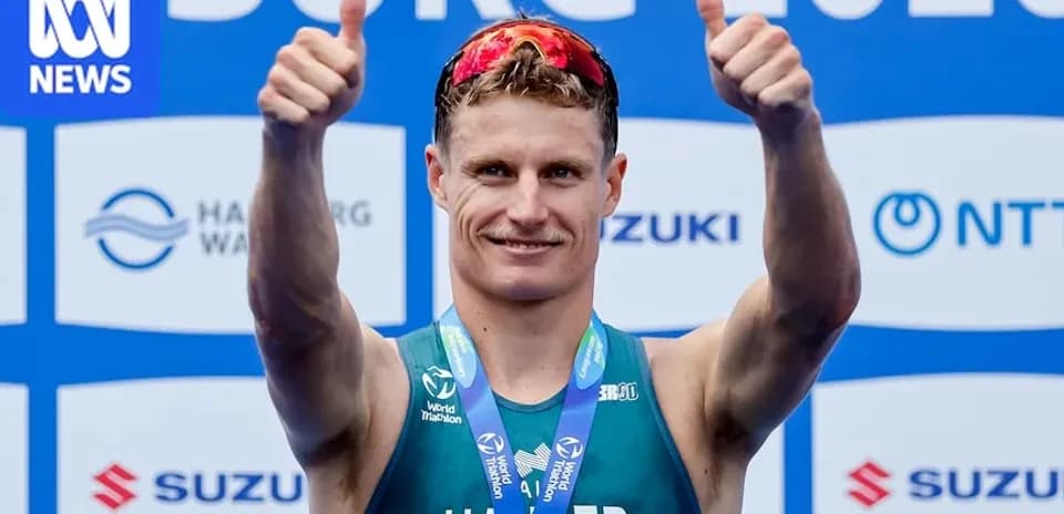 Athlete celebrating with thumbs up after competition