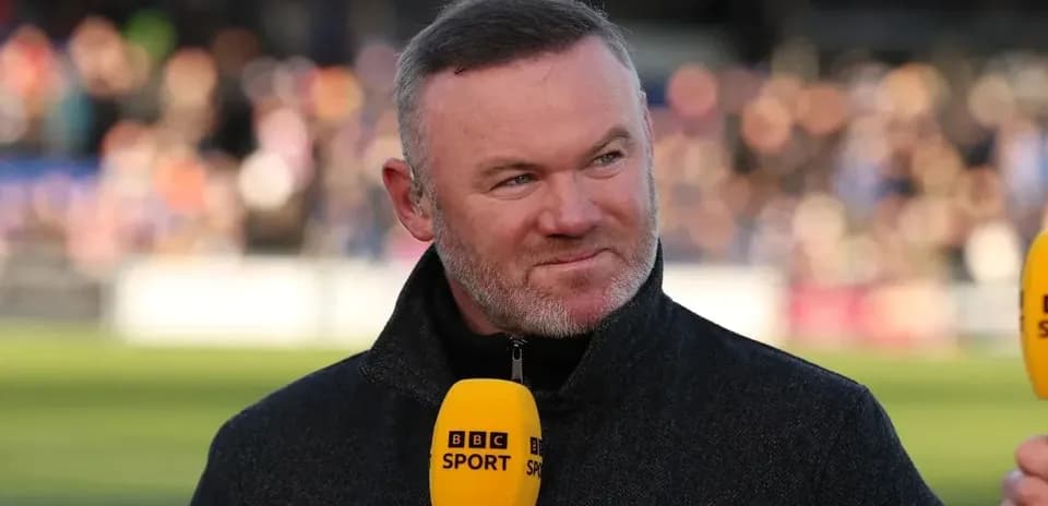 Presenter speaking with microphone at sports event