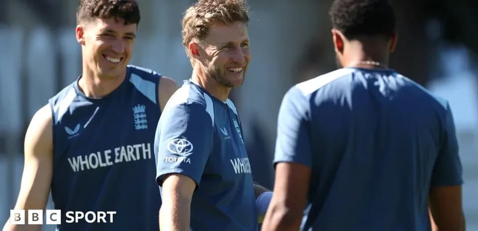 England players chatting during a training session
