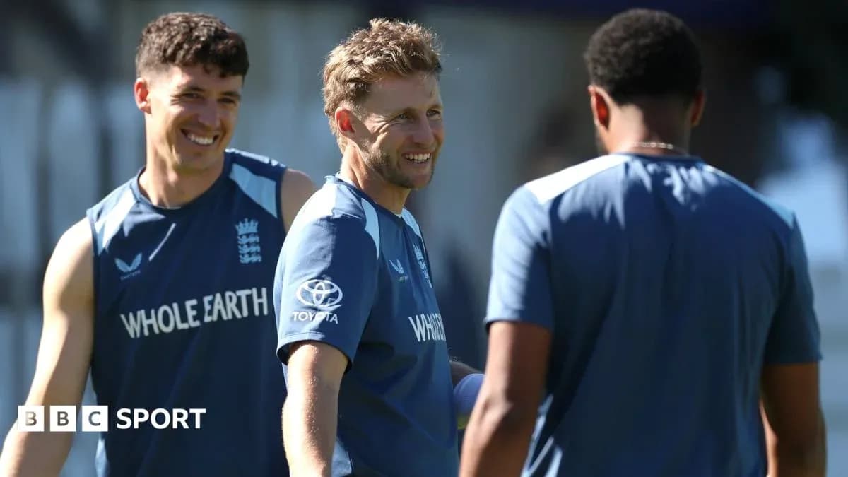 England players chatting during a training session