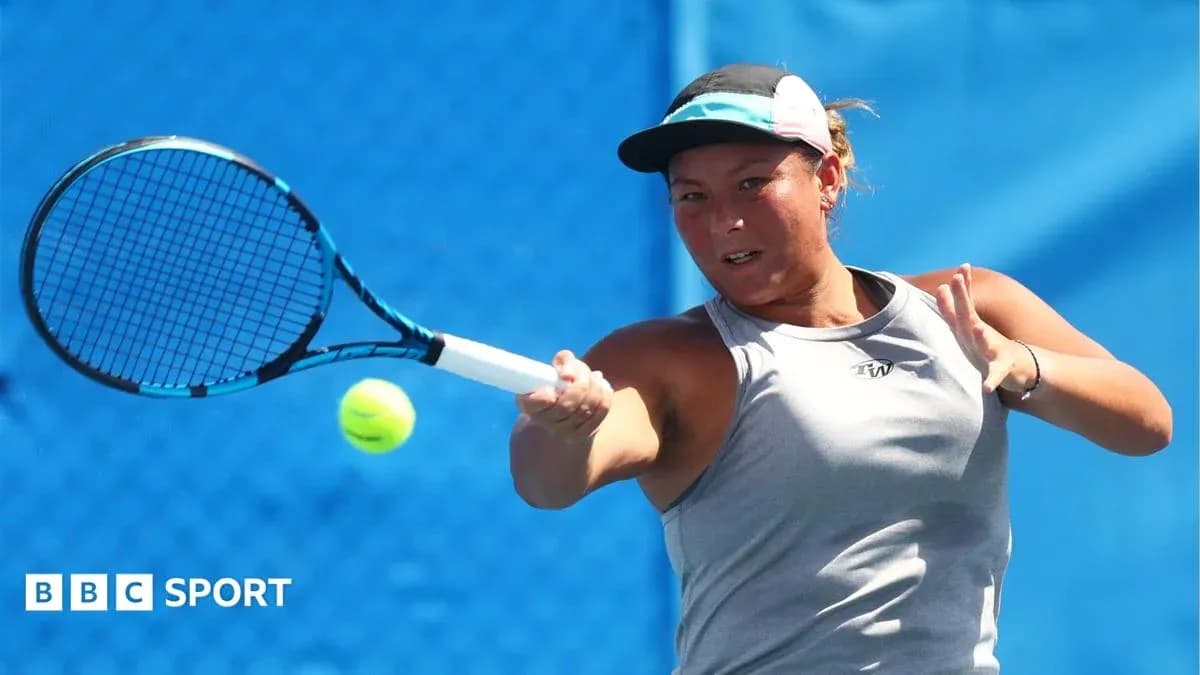 Tennis player hitting a ball during practice session