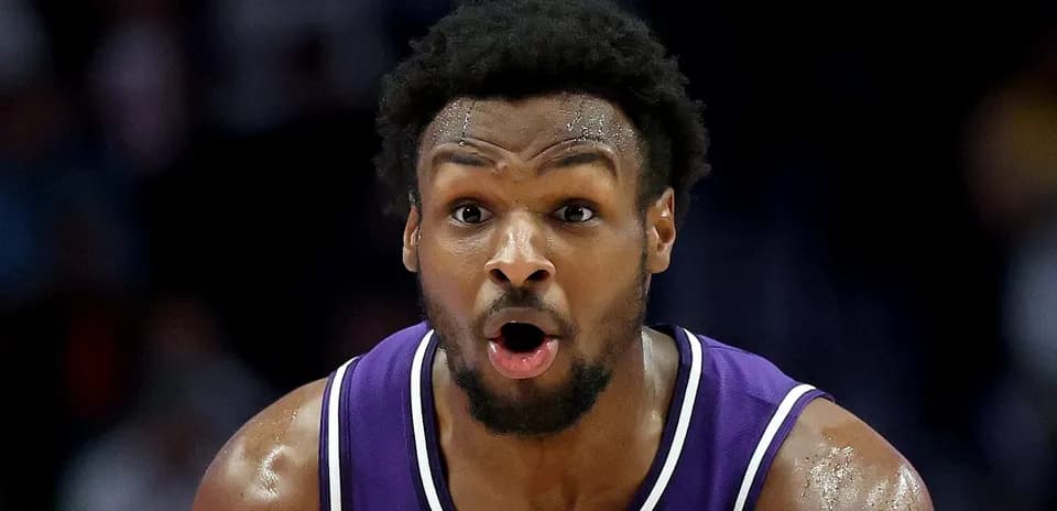 Player in purple jersey during intense game moment