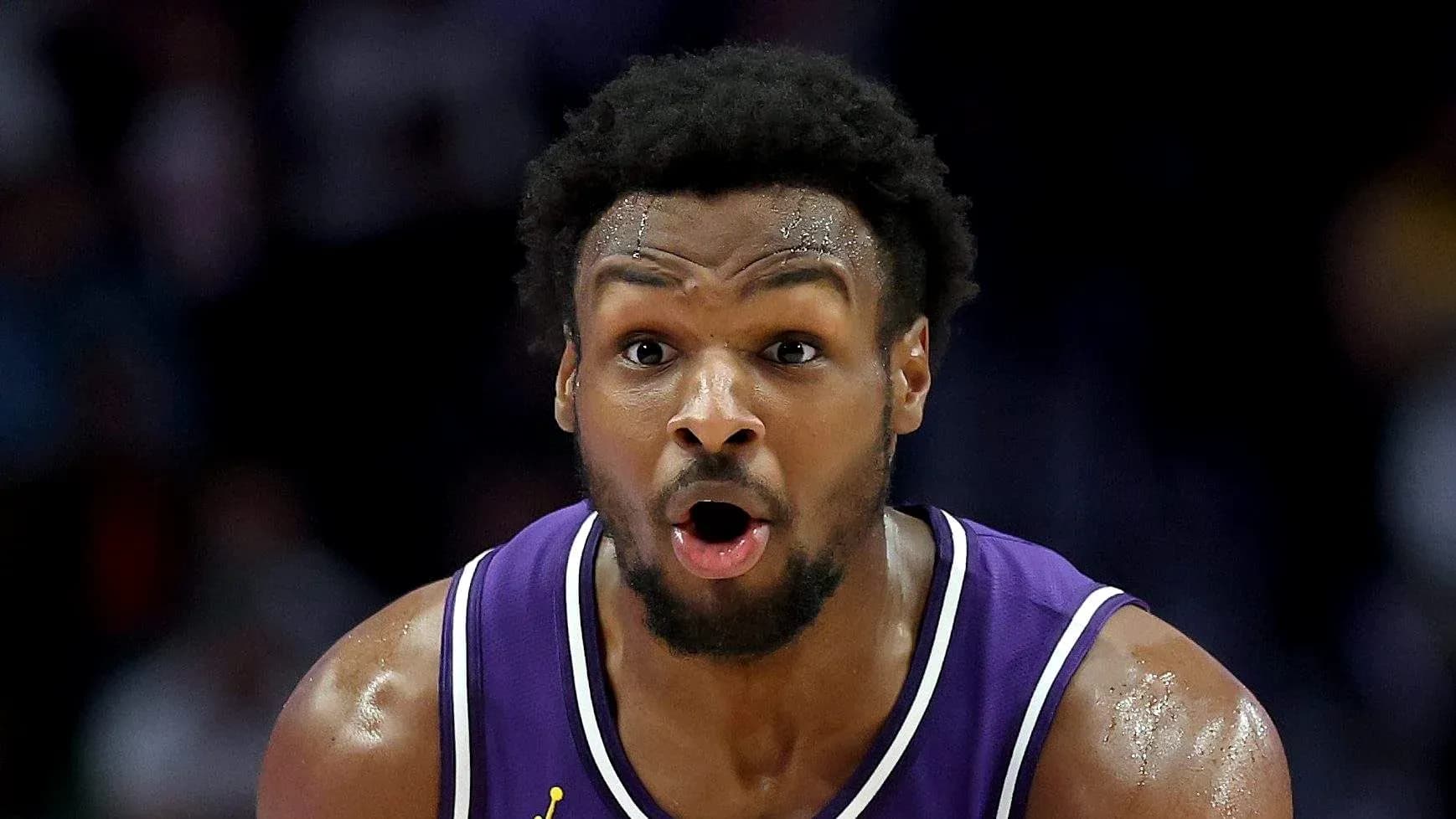 Player in purple jersey during intense game moment