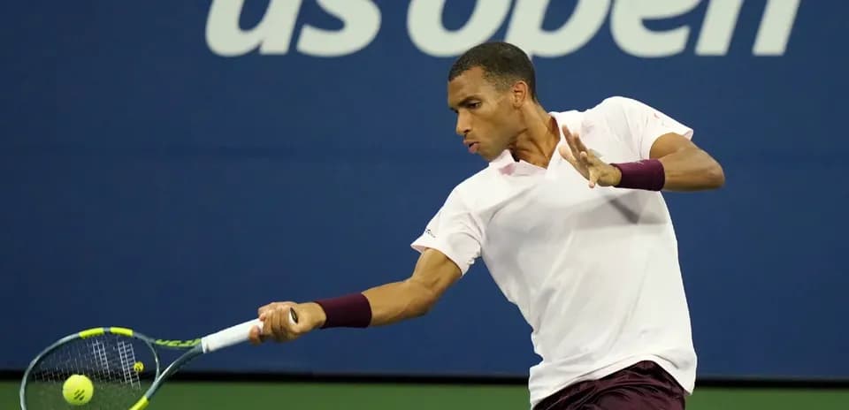 Player hitting a forehand during US Open match
