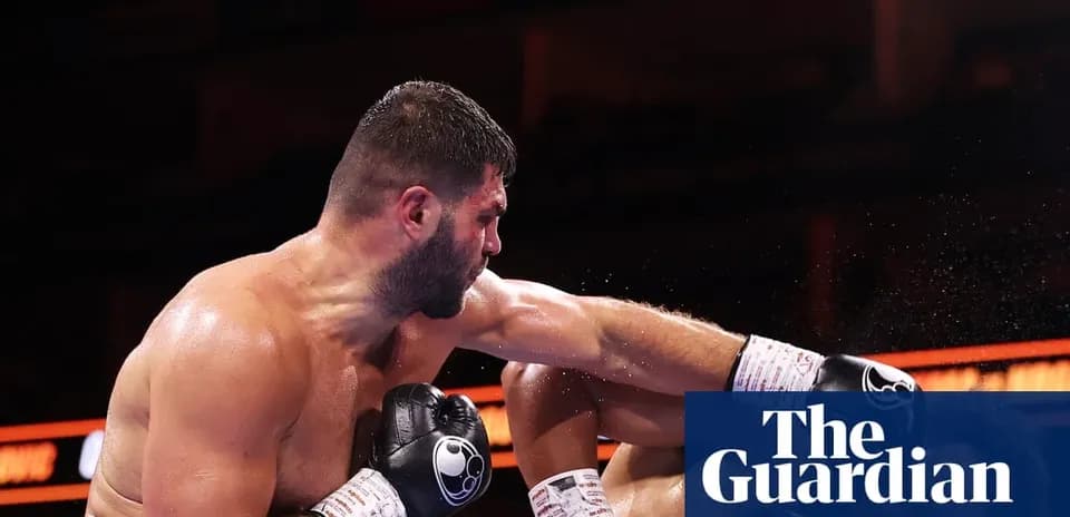 Boxer delivering a punch in the ring
