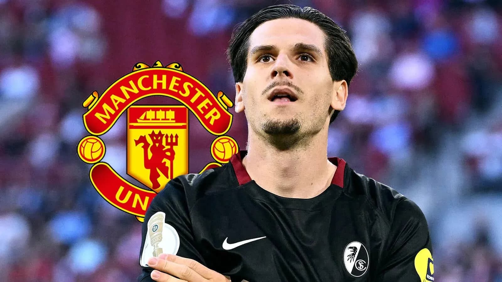 Player in black jersey with Manchester United logo backdrop