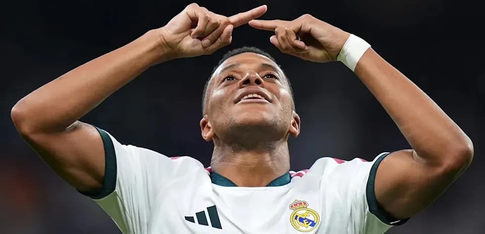Player celebrating after scoring a goal for Real Madrid