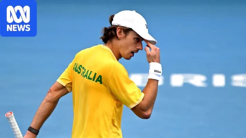 Tennis player in yellow Australia shirt during match