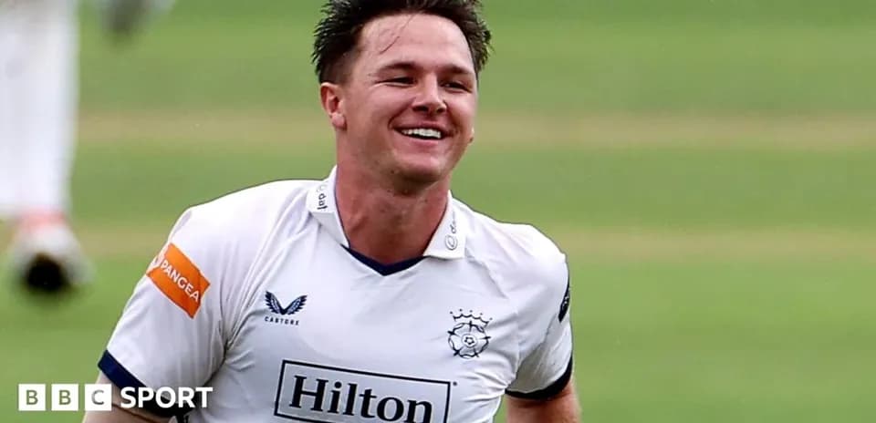 Cricketer celebrating a wicket on the field