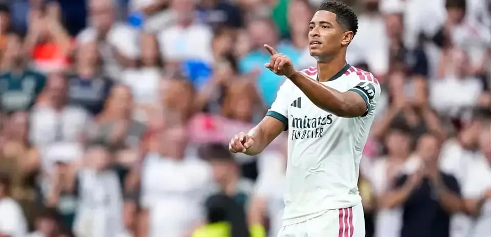 Player gesturing to fans during match celebration