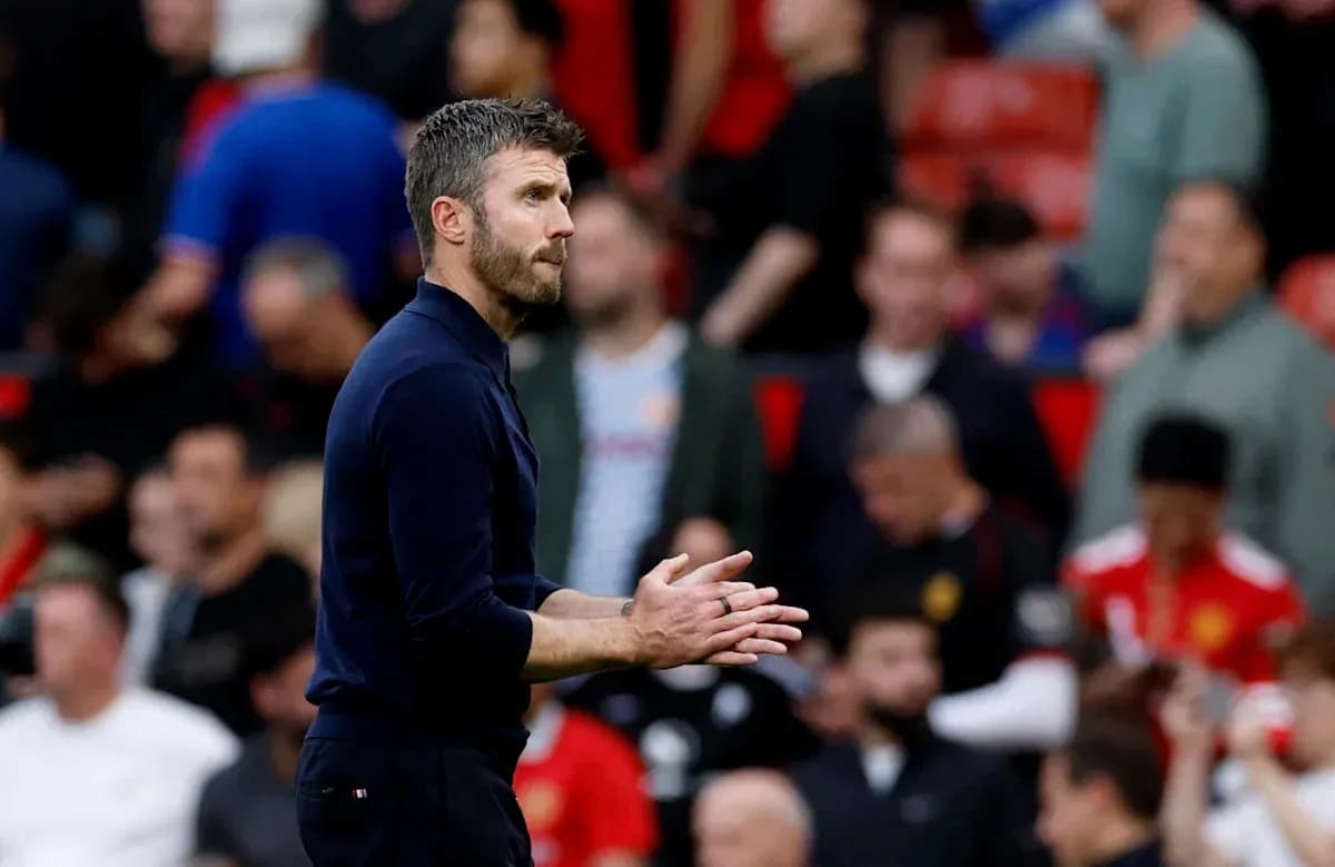Manager gesturing during match at Old Trafford