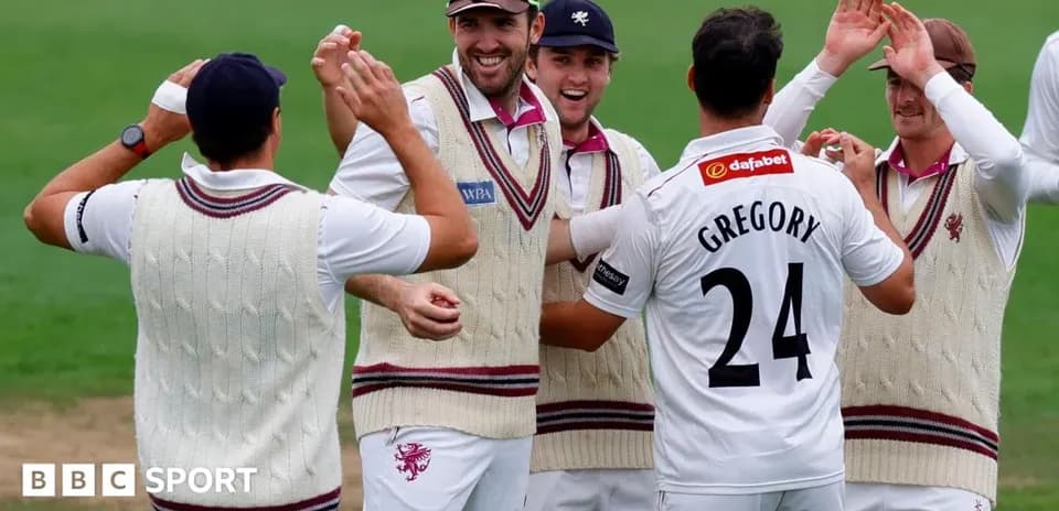 Cricketers celebrating with player Gregory after wicket