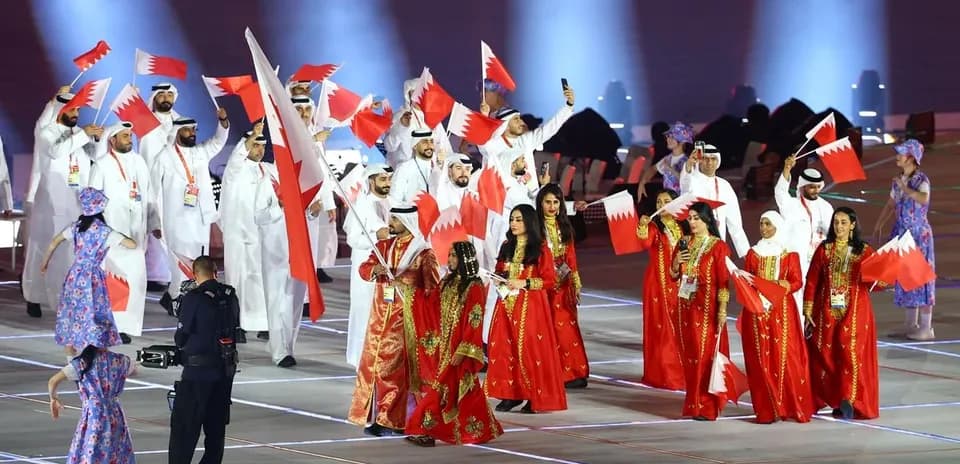 Bahrain team celebrating with flags during event