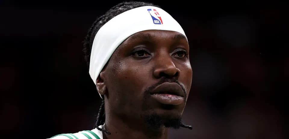 Basketball player wearing headband during game