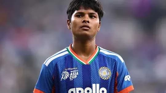 Player wearing blue jersey during Asia Cup match