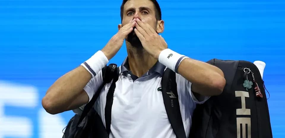 Novak Djokovic blowing kisses after a match