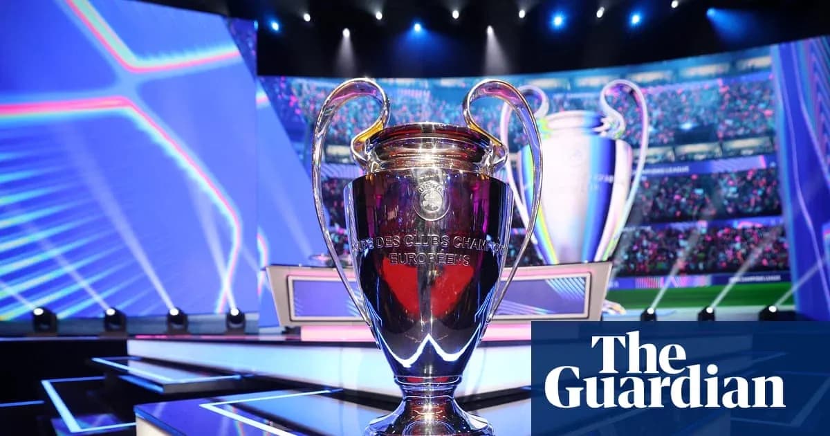 Champions League trophy displayed on stage