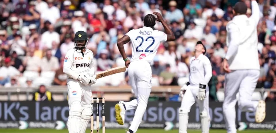 Bowler celebrating wicket as batsman stands shocked