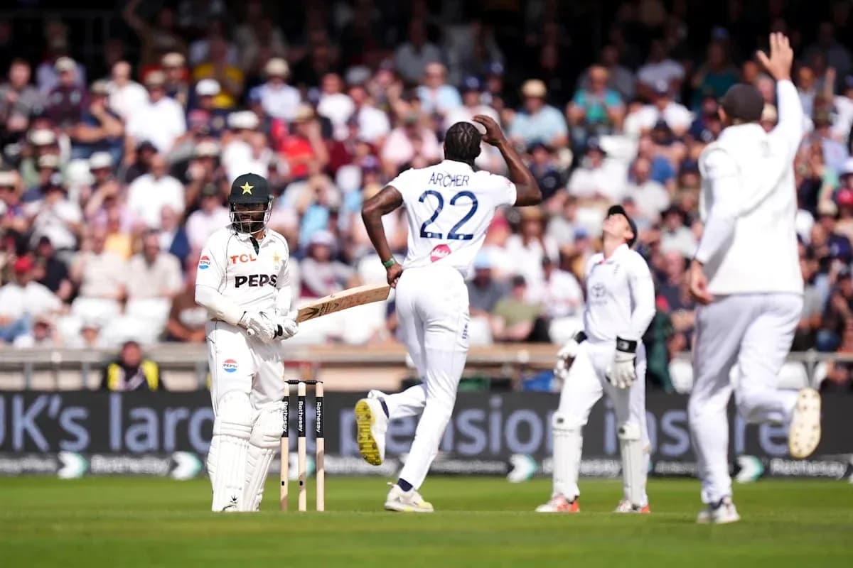 Bowler celebrating wicket as batsman stands shocked