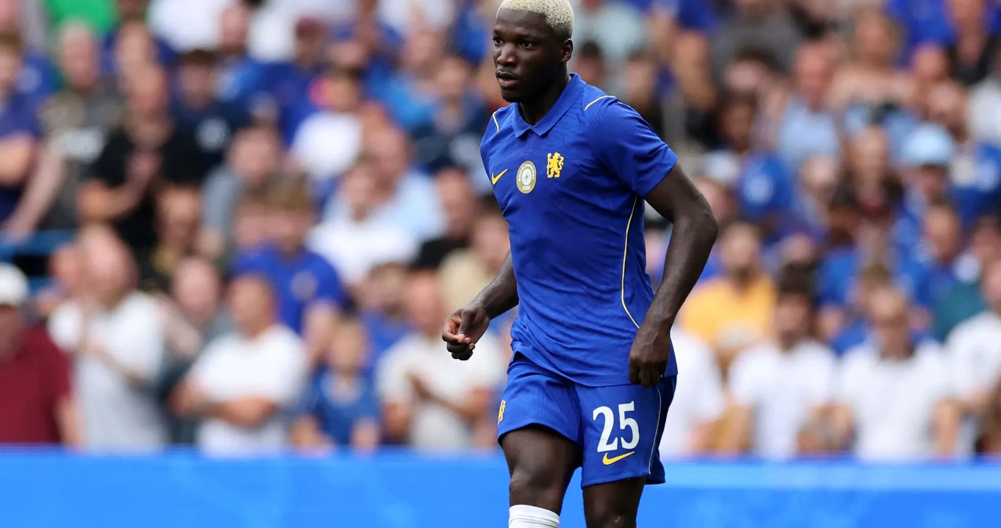Player in blue Chelsea kit during match
