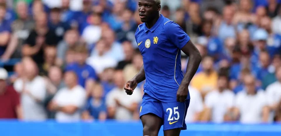 Player in blue Chelsea kit during match